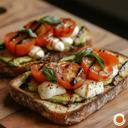 Imagine sinking your teeth into a slice of perfectly toasted sourdough, topped with a creamy layer of ripe avocado, juicy cherry tomatoes, and fresh mozzarella, all drizzled with a rich balsamic glaze. This is the essence of Grilled Caprese Avocado Toast Delight—a mouthwatering dish that brings together the best of both worlds: the classic Italian Caprese salad and the trendy avocado toast. This delightful combination not only tantalizes the taste buds but also offers a nutritious boost, making it an ideal choice for brunch or a light snack.